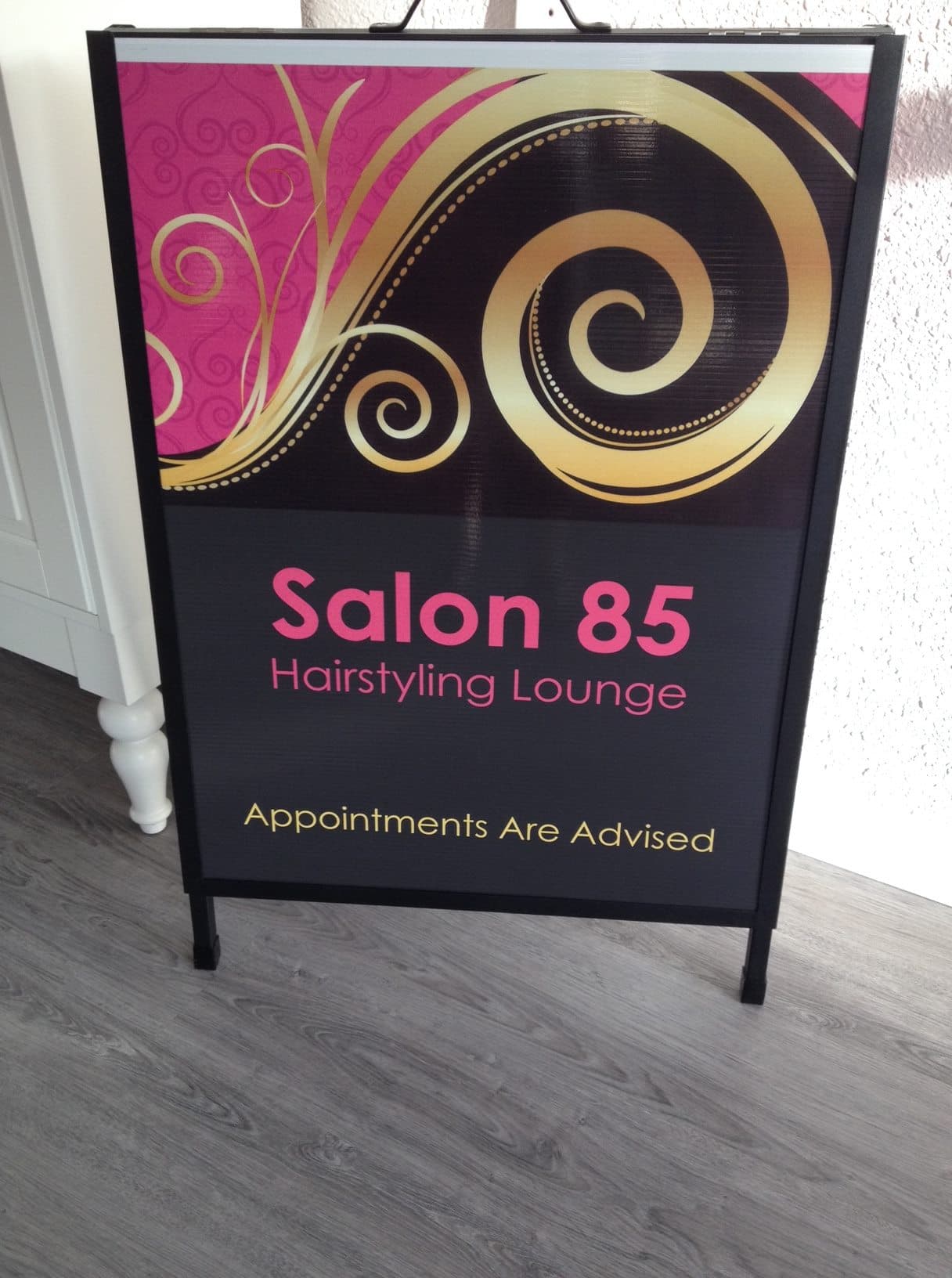 Salon 85 logo