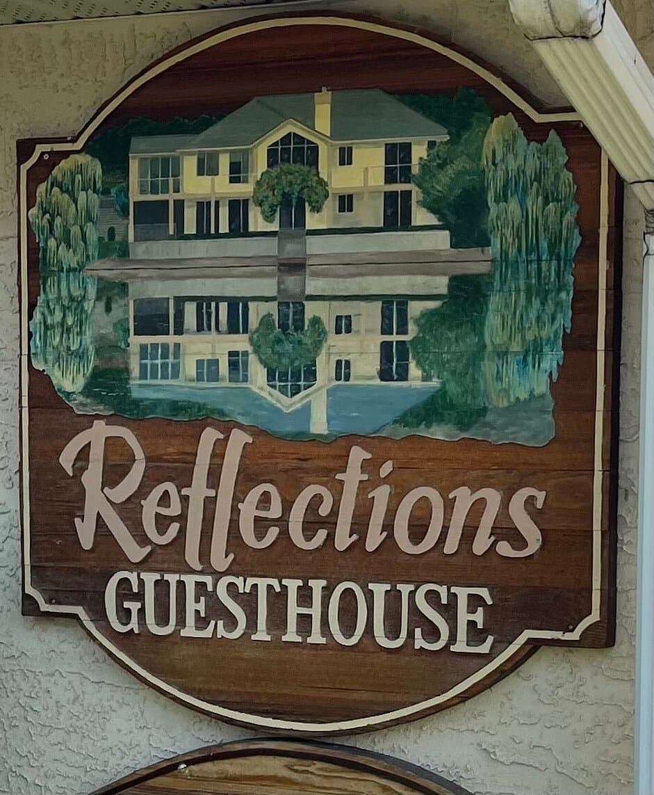 Reflections Guest House logo