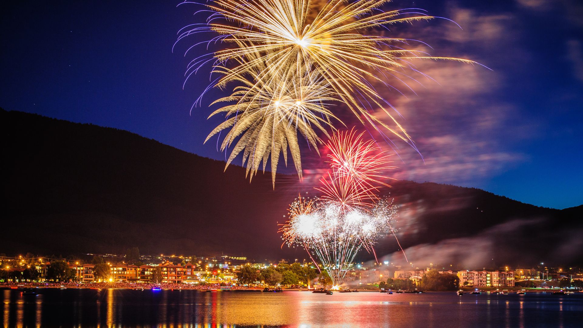 Fireworks burst over Osoyoos Lake to end the evening at Cherry Fiesta