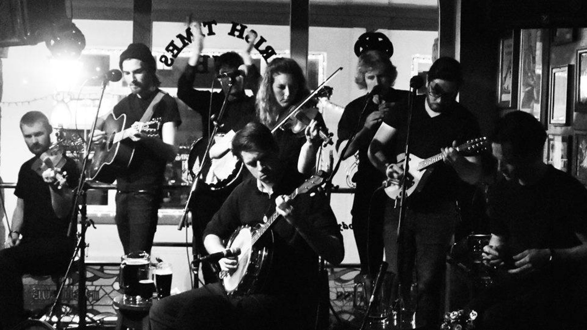 black and white image a band live in action